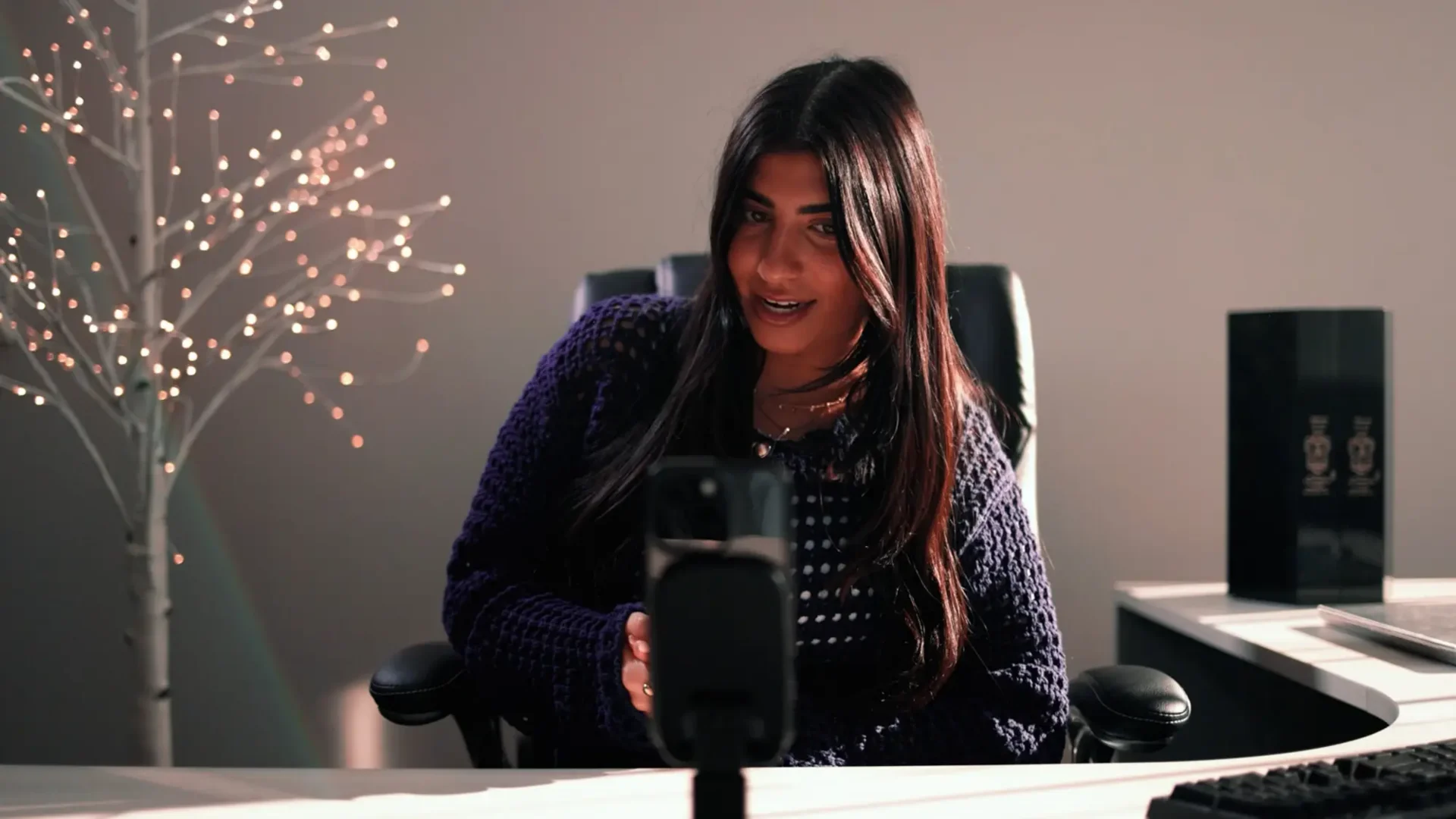 Annabelle Saco filming a TikTok on her phone