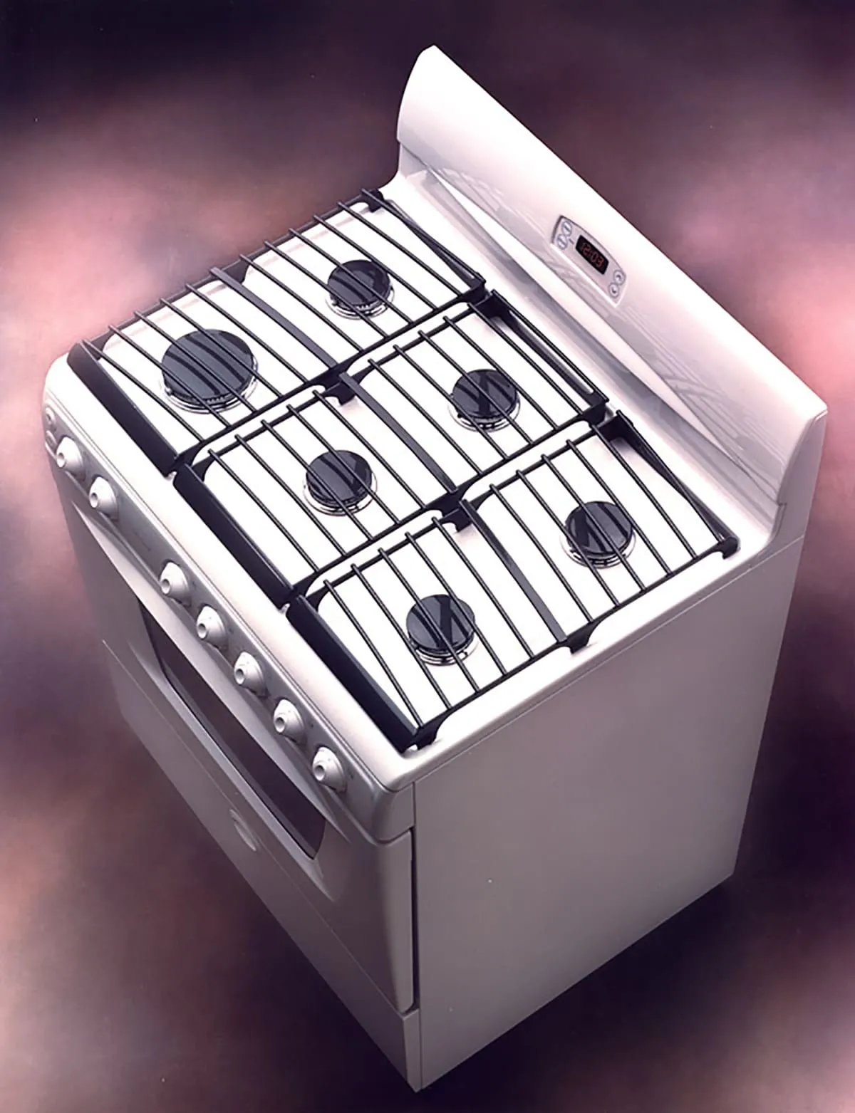A white and black oven range with six burners