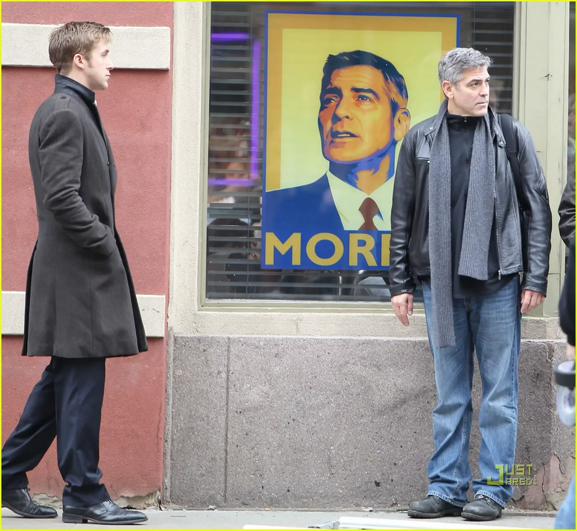 Still image from the film Ides of March featuring an illustrated prop poster by Michael Maher Jr.