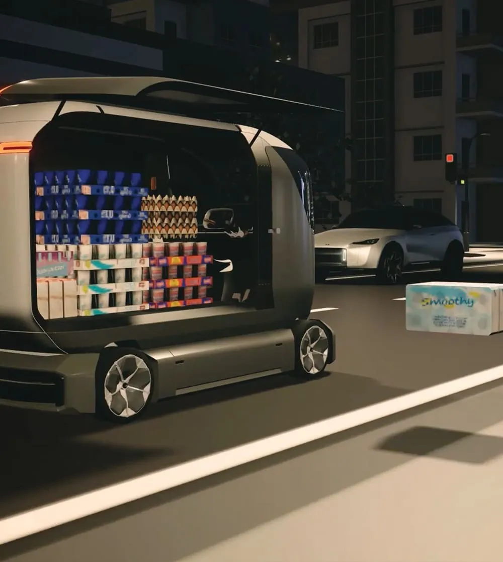 A vehicle on a road with an open side; the vehicle has a bunch of products inside