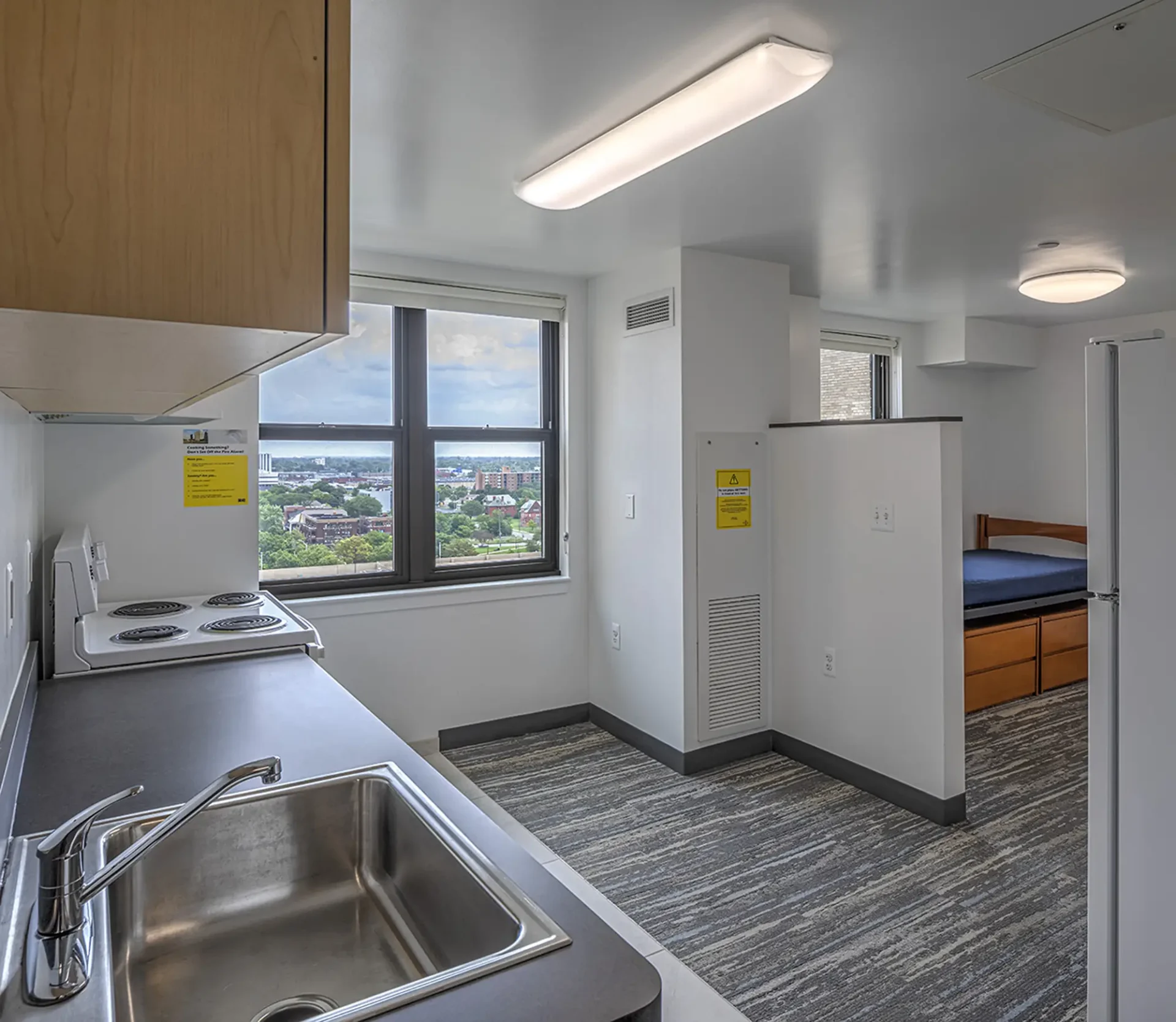 An interior shot of a dorm at the ACB on the Ford Campus. You can see the kitchen and a sleeping area