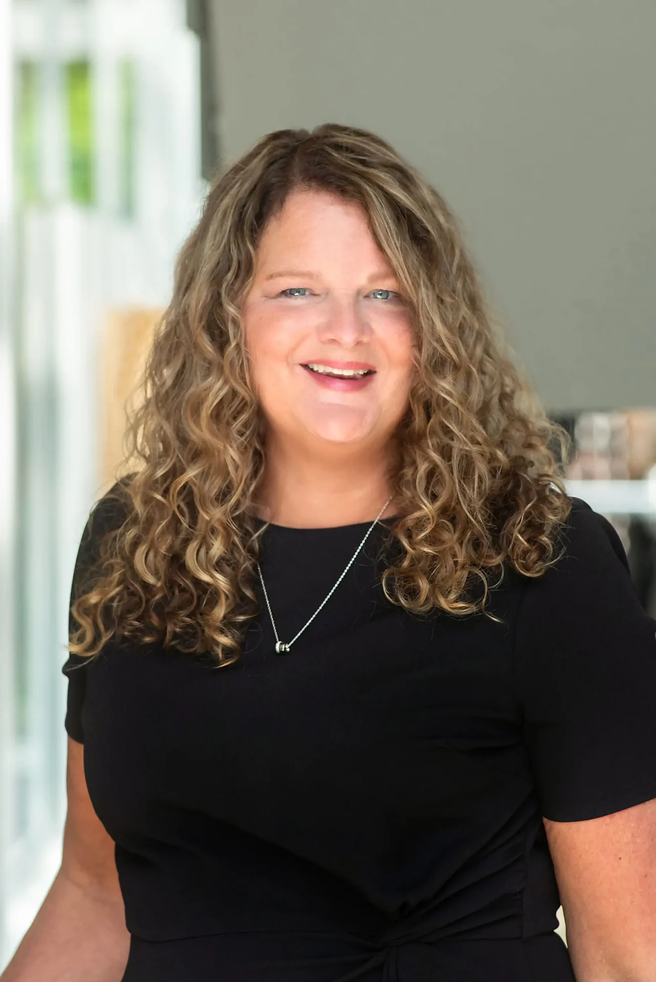 A headshot of Denise Thomas