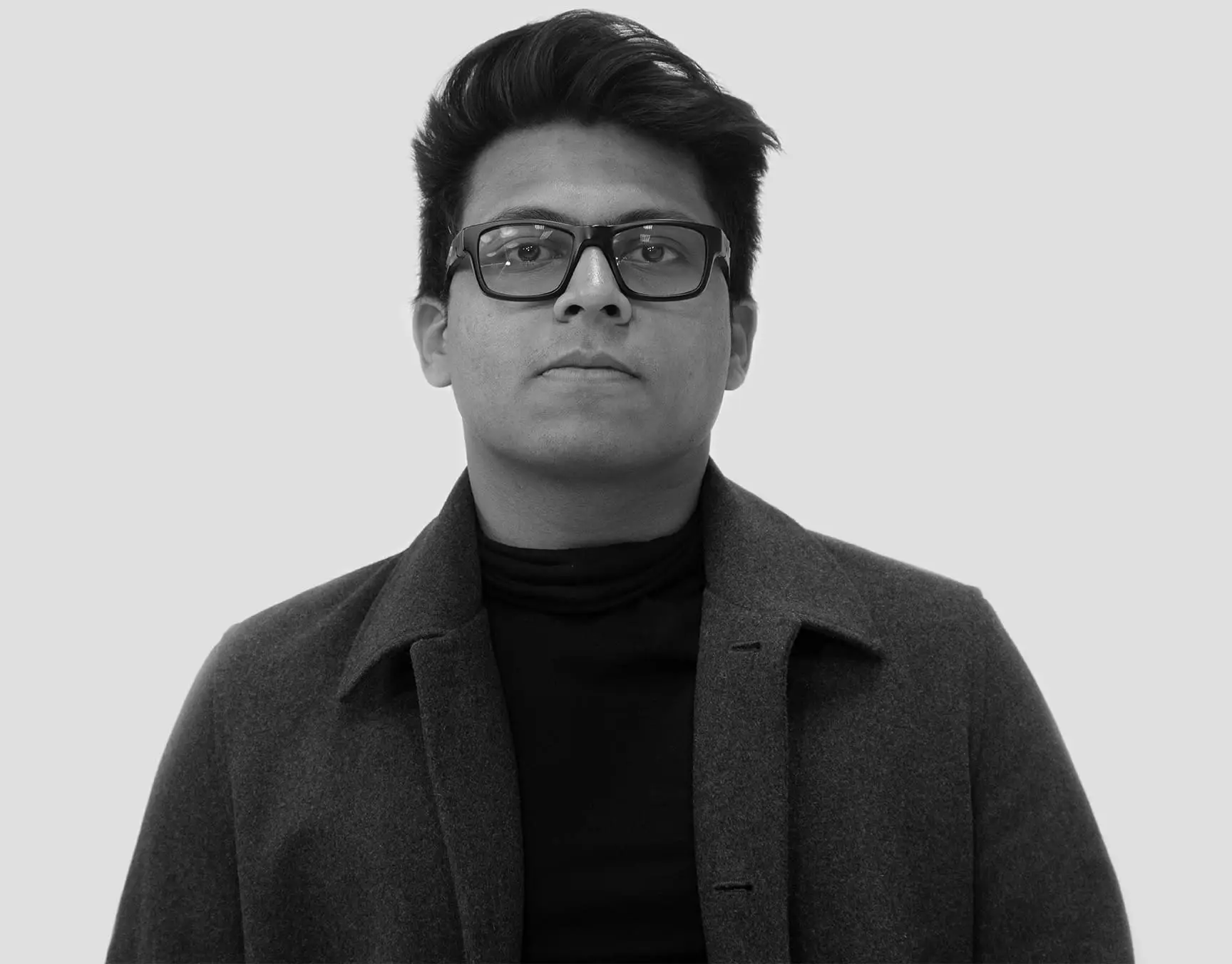 A headshot of Om Patil