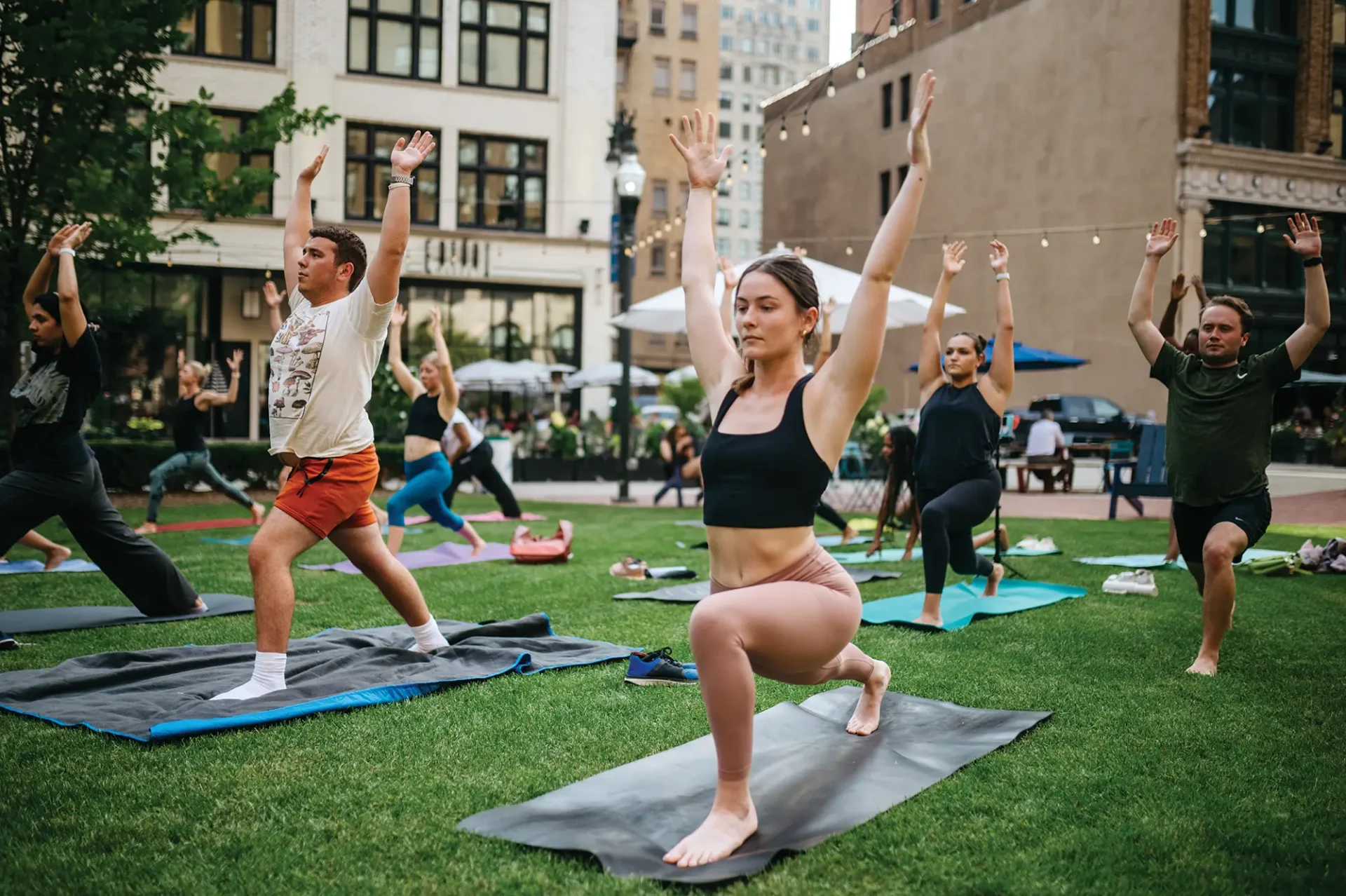 People doing yoga at campus martius