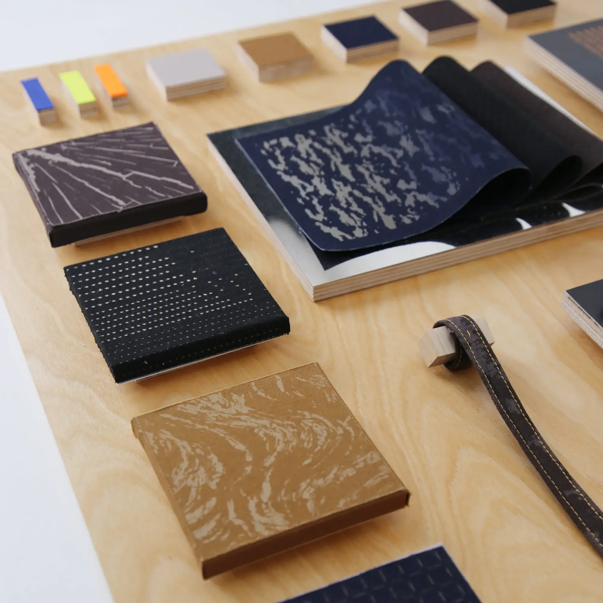 A close up angled shot of various tiles, textures and materials