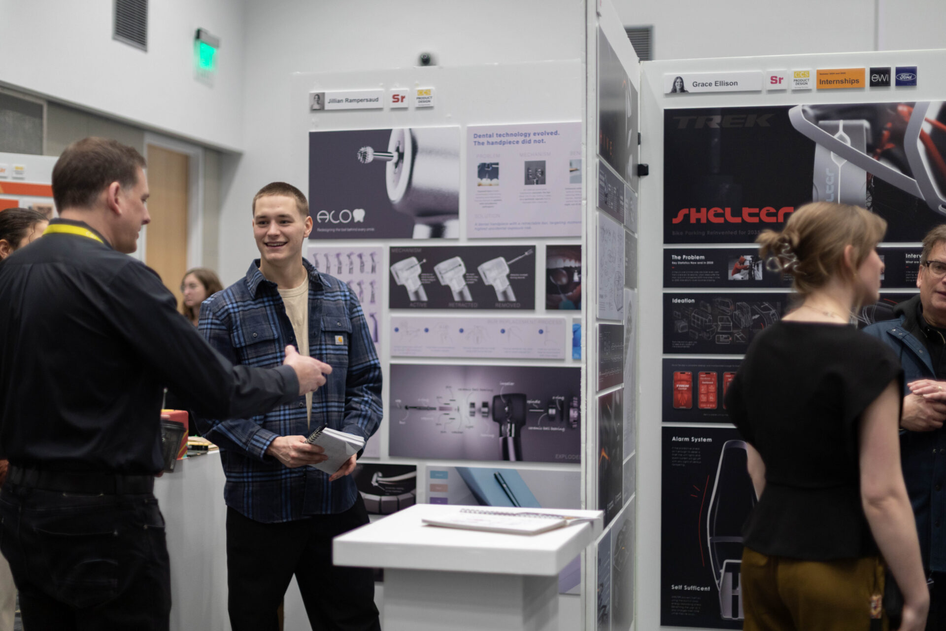 Students presenting design projects to industry professionals.