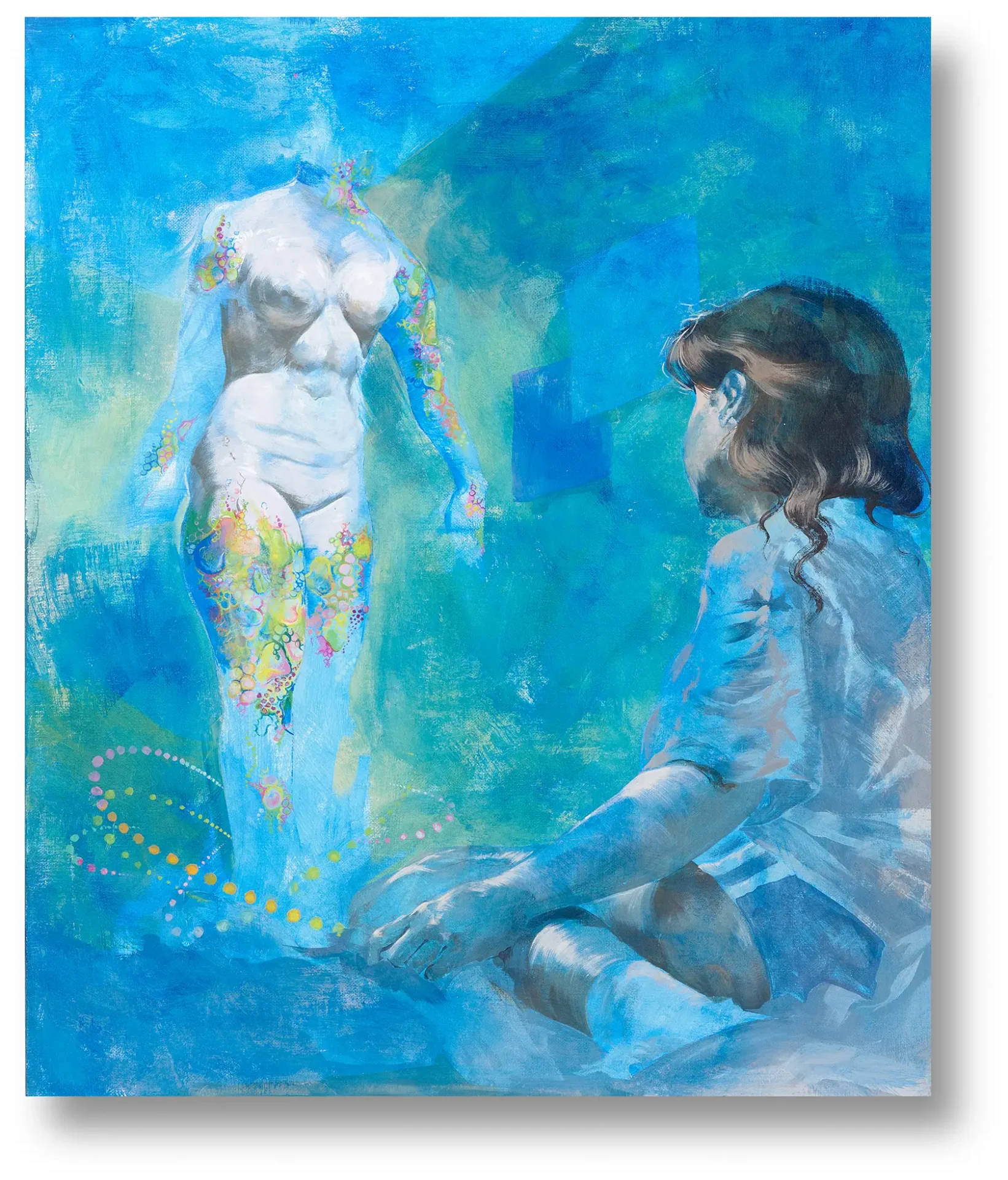 Girl looking at nude figure with colorful tattoos