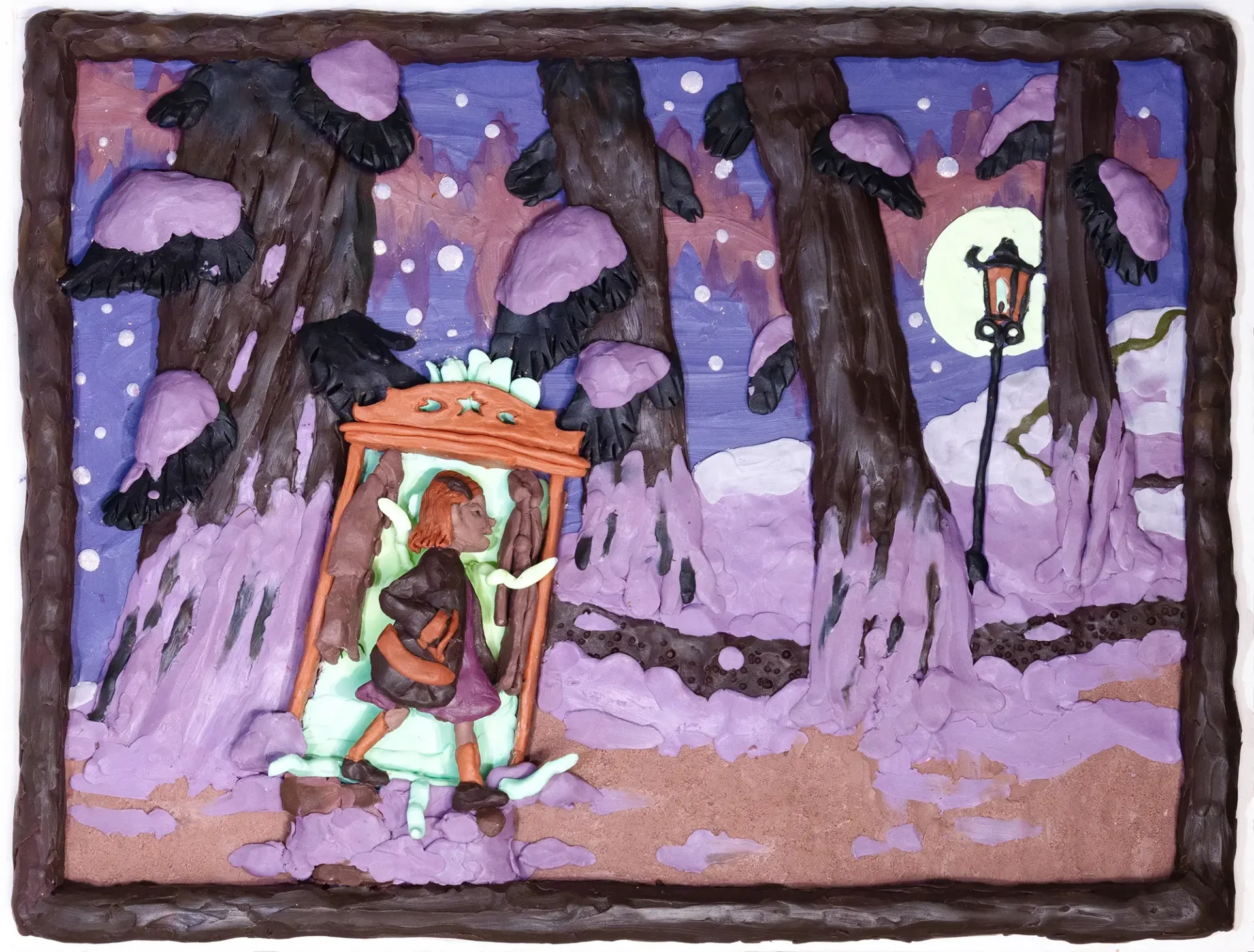 A girl walks in a snowy forest