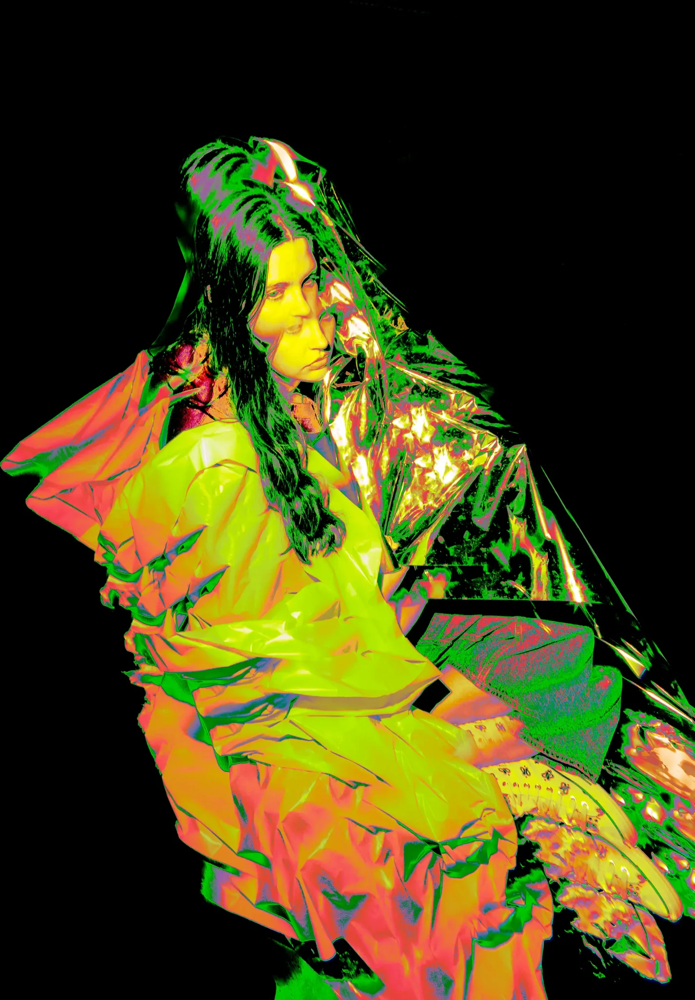 A female figure layred with neon colors on a black background.