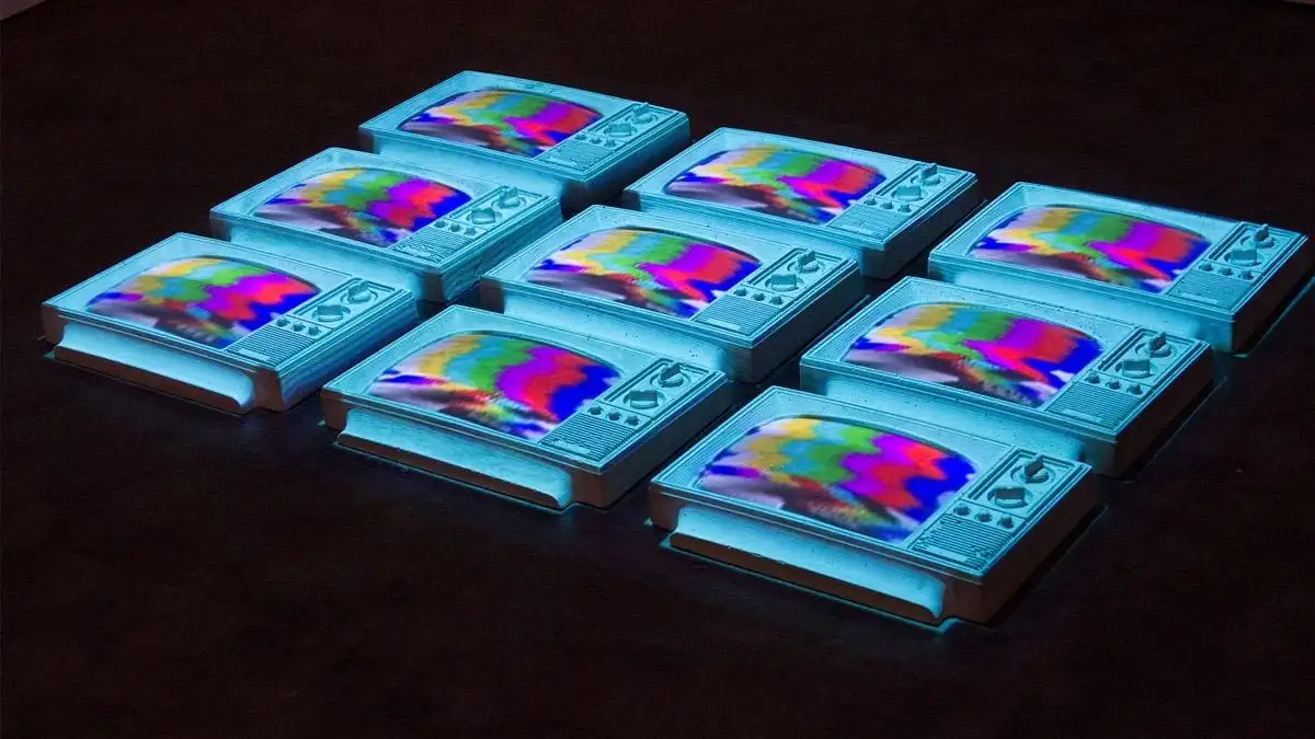9 compressed televisions, arranged in a grid, featuring wavy colored bars on the screens