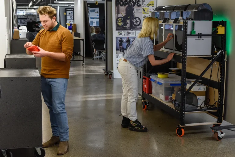 Students working in the 3D printing lab