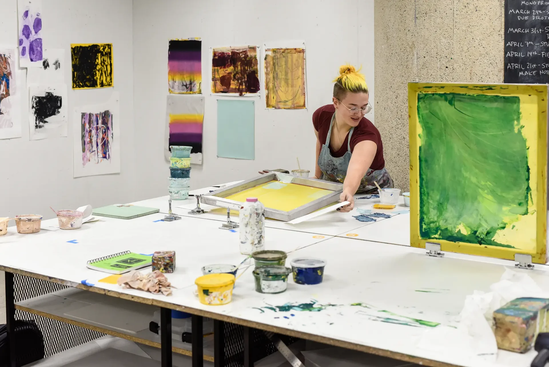 Student working in the printmaking studio.