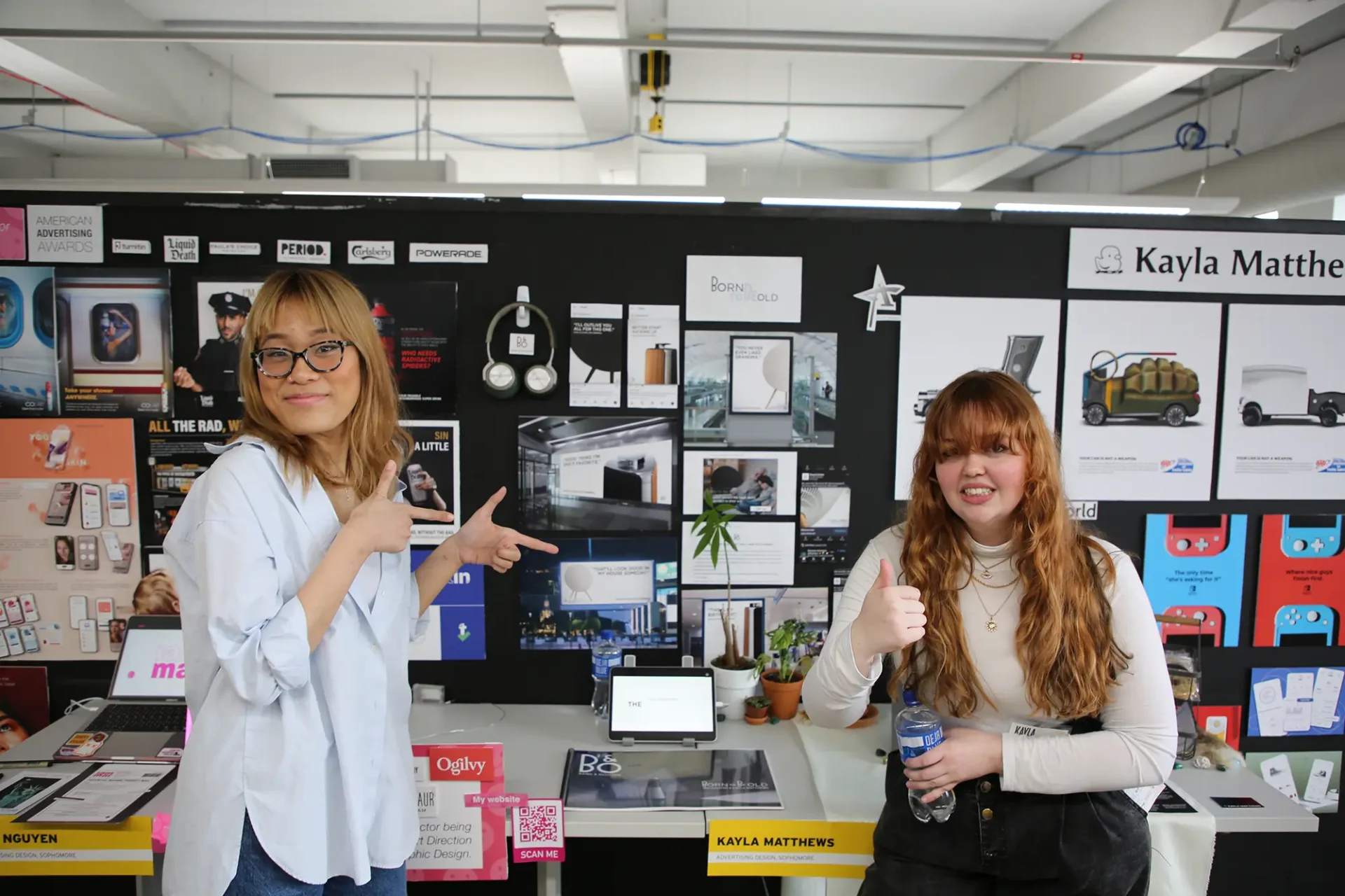 Students showing off their work.