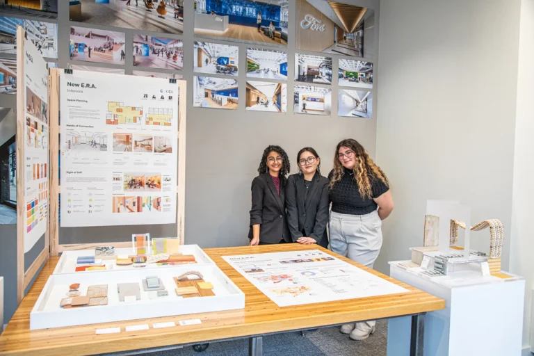 Students in front of their final projects.