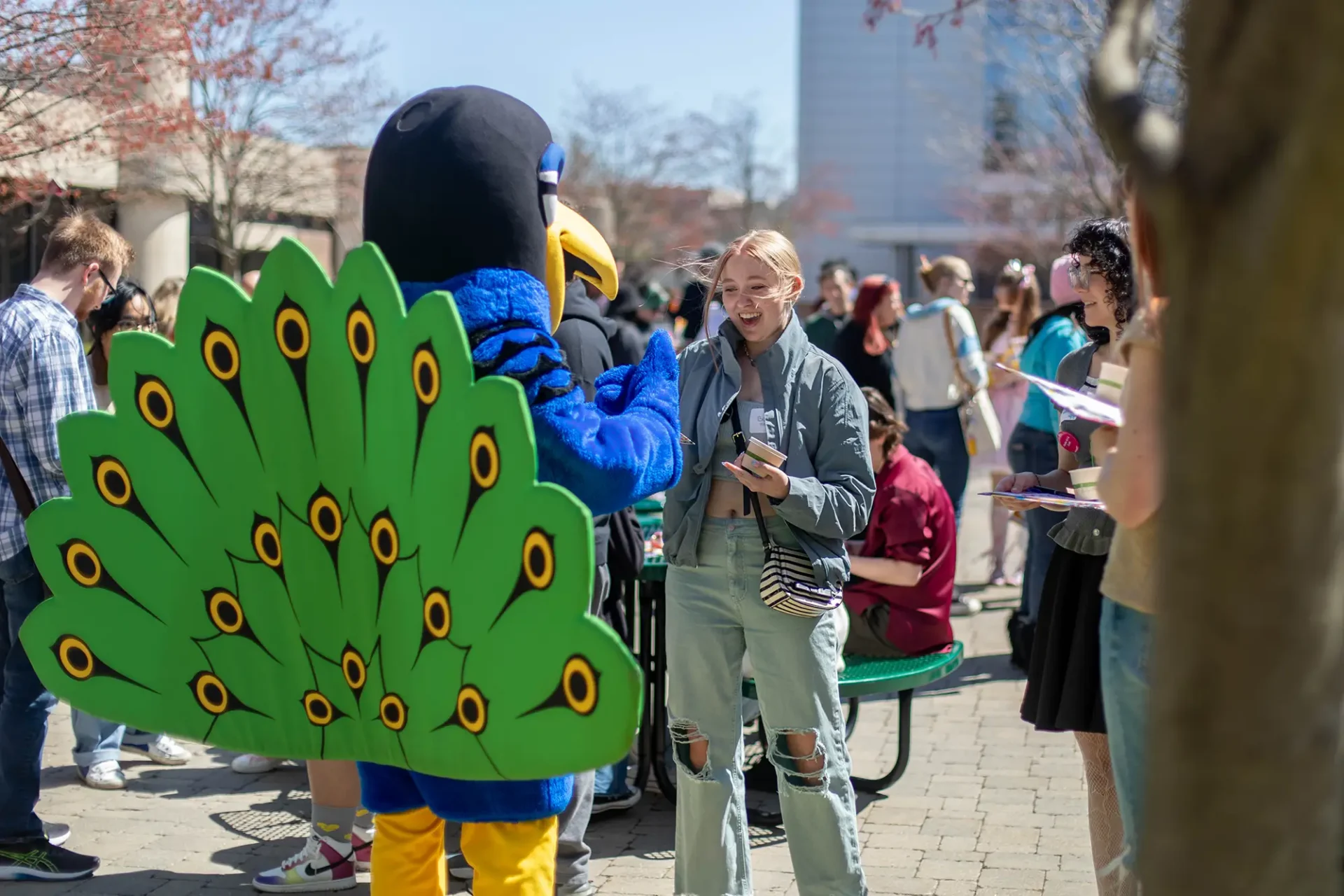 Student hanging out with Watson Peacock.