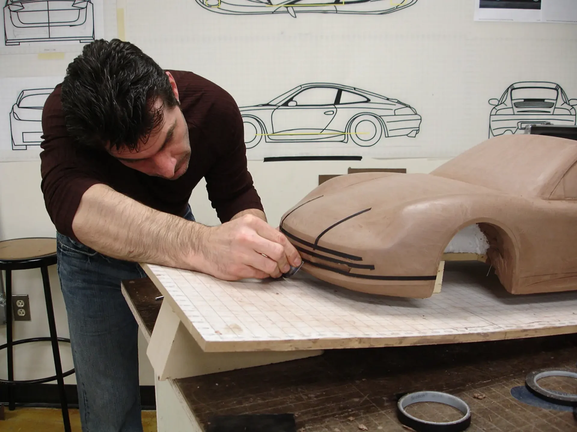 Professional Automotive Modeling student working on their clay model.
