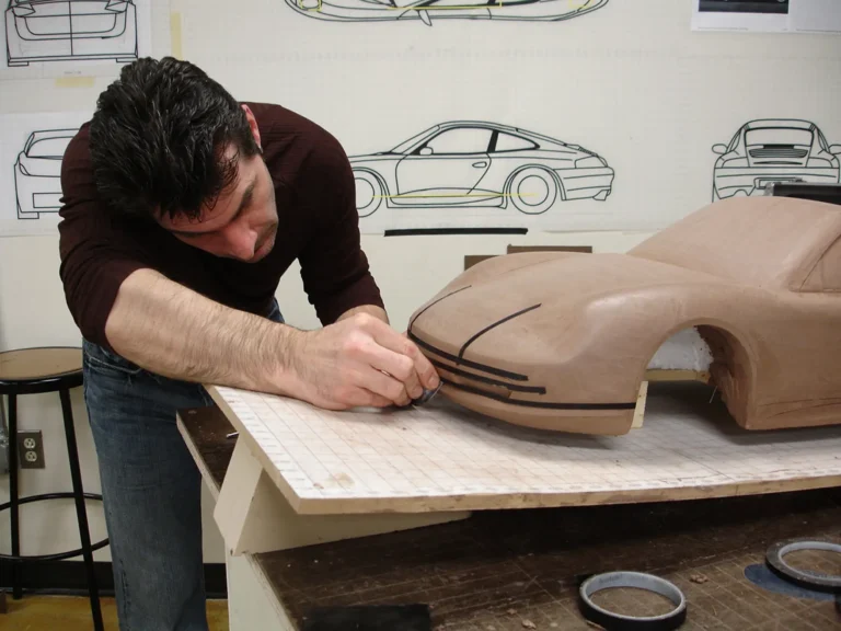 Professional Automotive Modeling student working on their clay model.