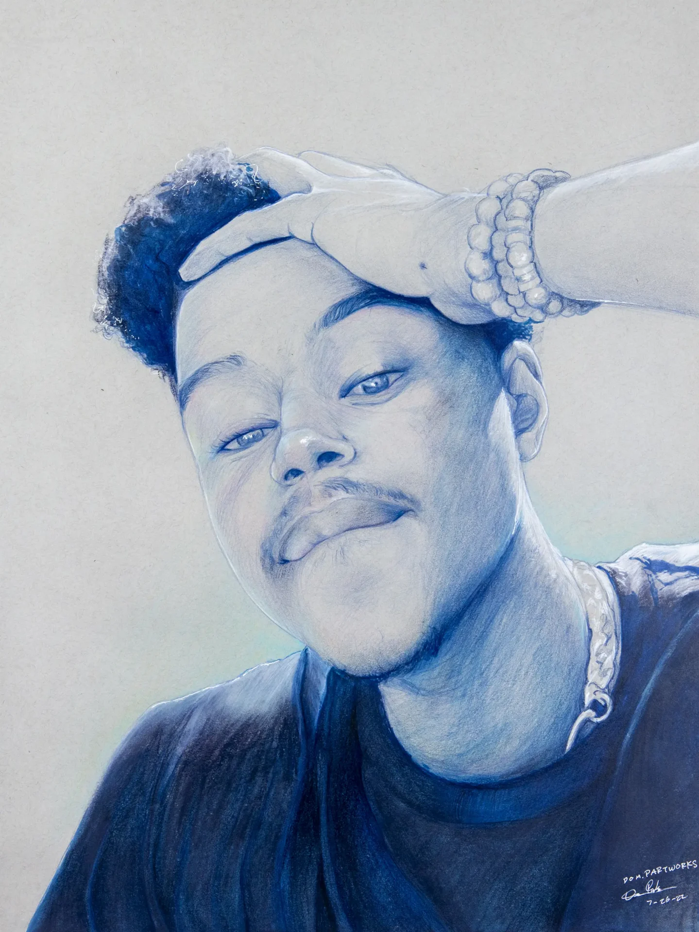Dual Enrollment blue colored pencil self portrait drawing.
