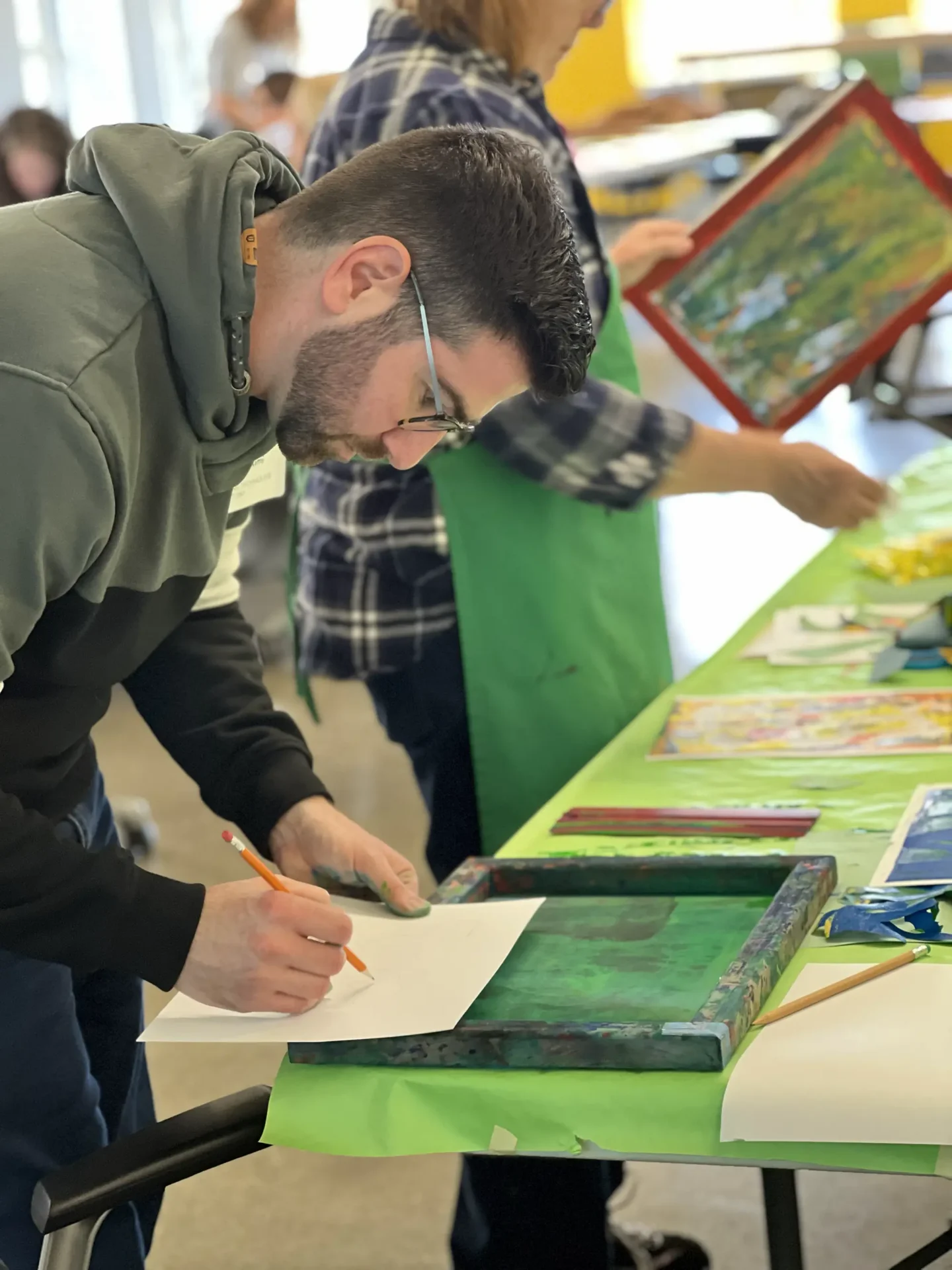 Man working on a printmaking project.