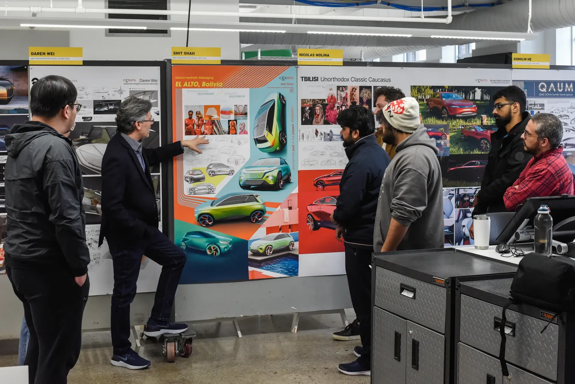 Graduate students having a critique of transportation design models.