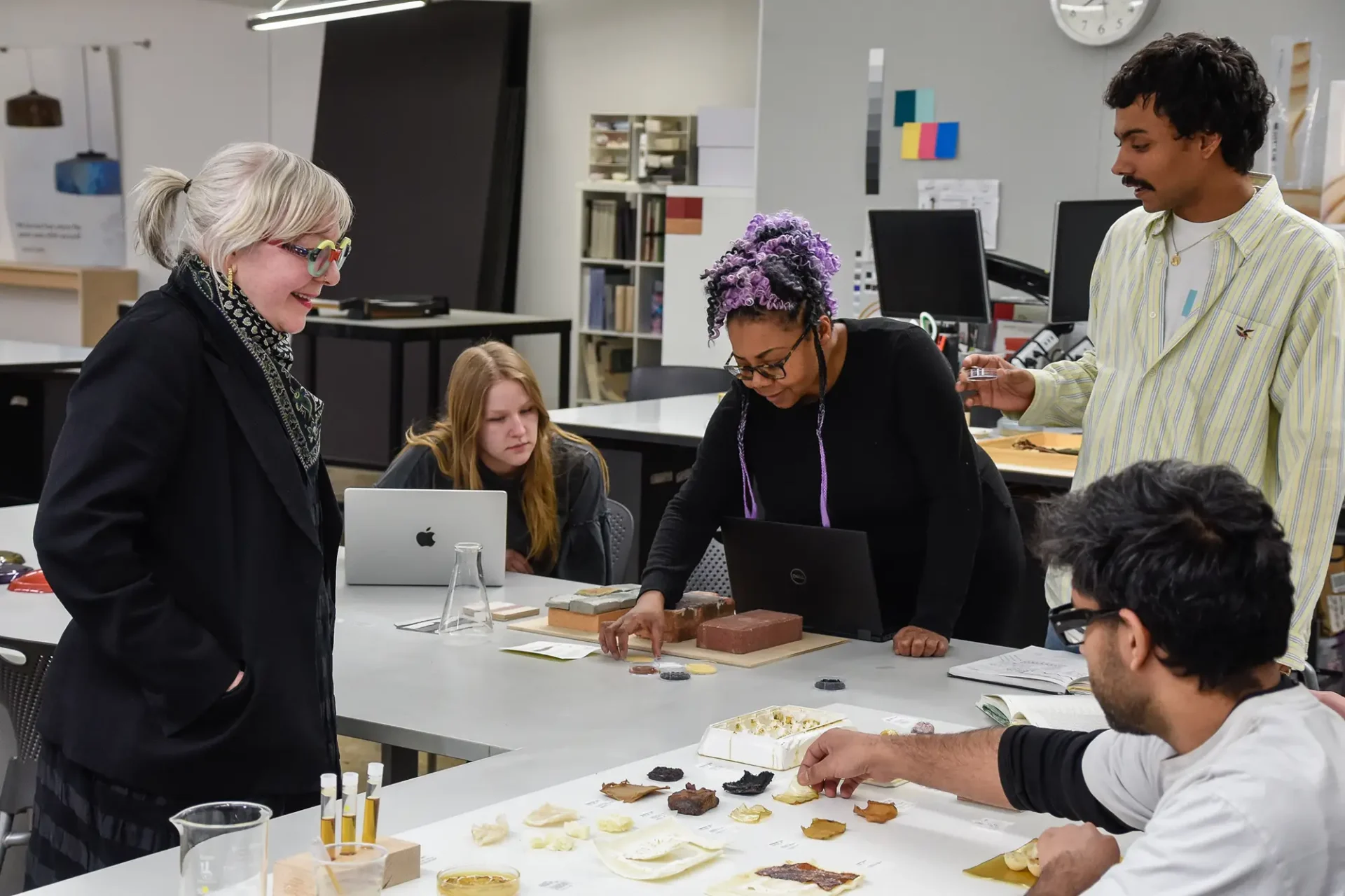 Graduate Studies Color & Materials Design students review a project as a classroom discussion.