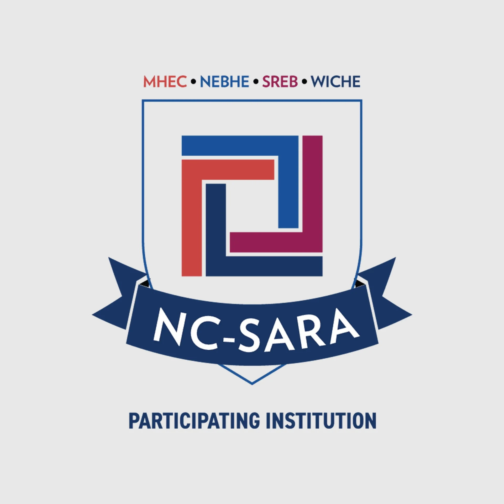 NC-SARA Participating Institution logo. A white shield with a blue ribbon reading "NC-SARA" and the words "PARTICIPATING INSTITUTION" below it.