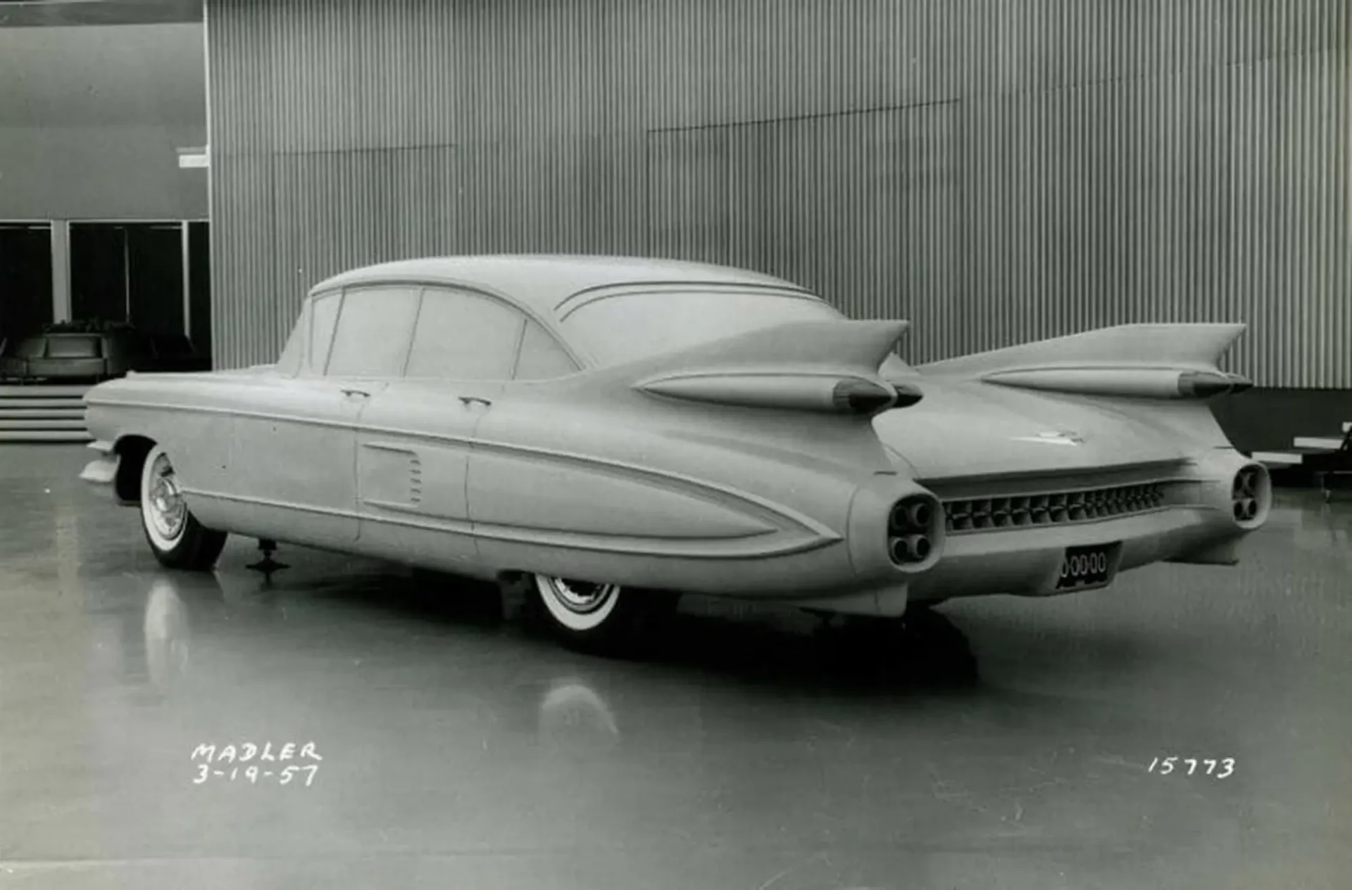 A rear view shot of a large scale model of a sedan with huge taillights