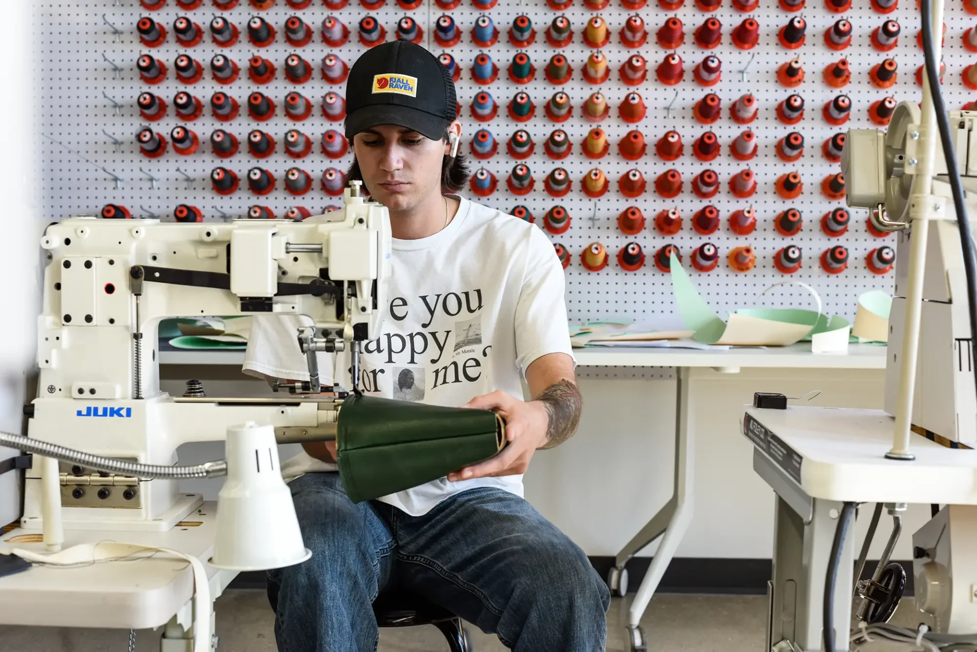 Work Study student working with a sewing machine.