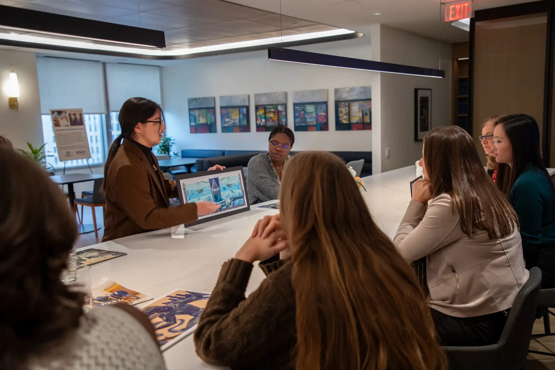 Students presenting their work to industry professionals.