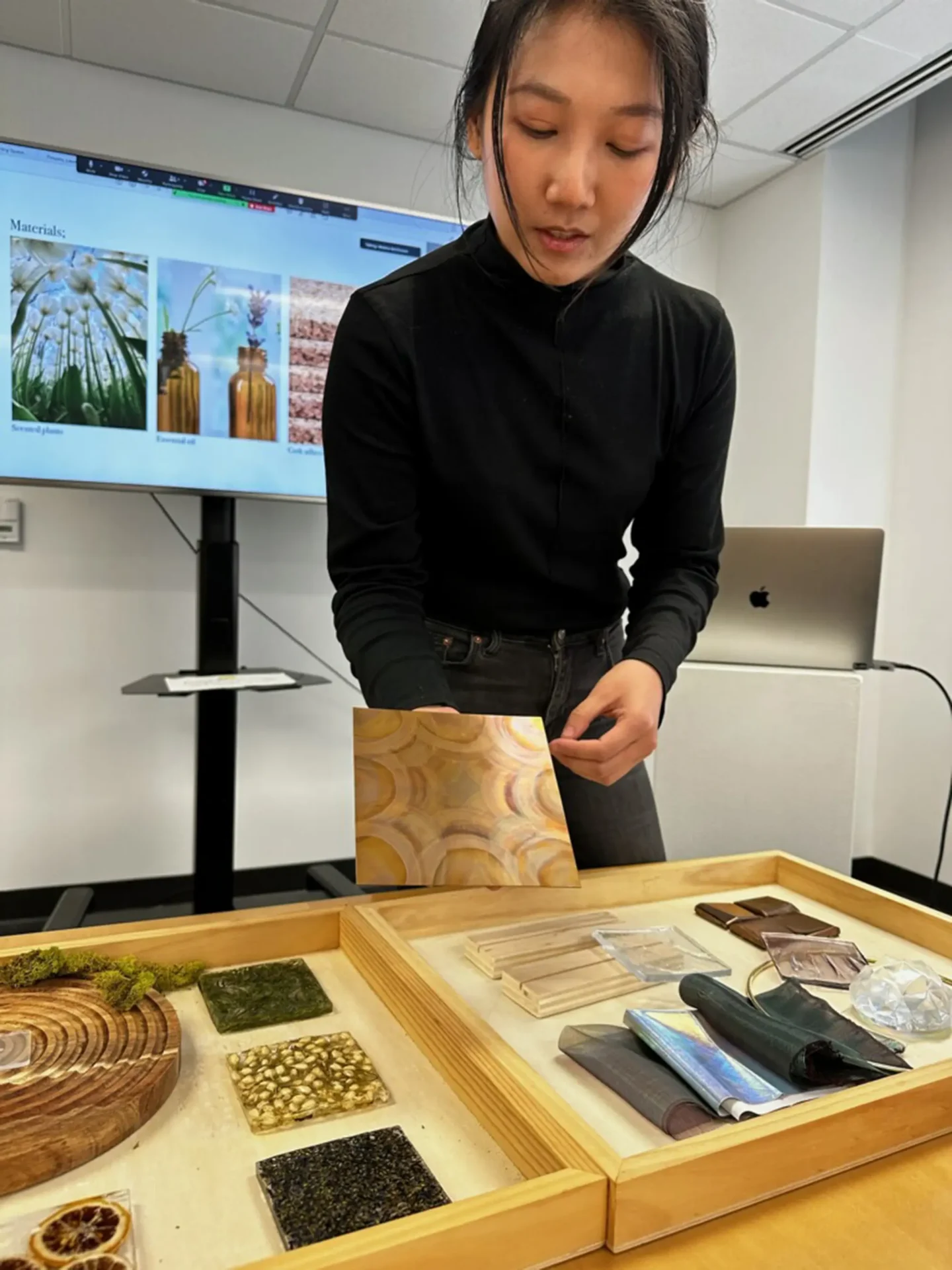 Student showing materials as part of a sponsored project.