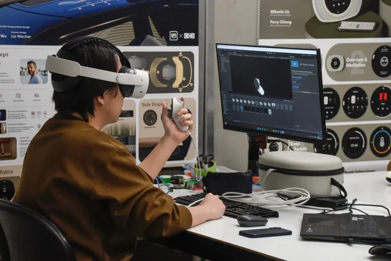 Graduate Studies student working in VR on their project.