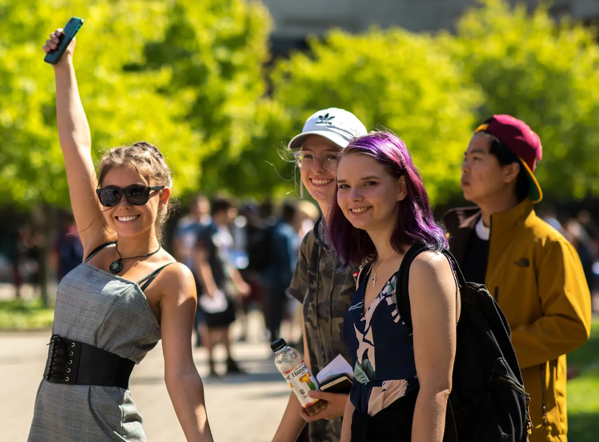 Excited students are walking across CCS's campus.